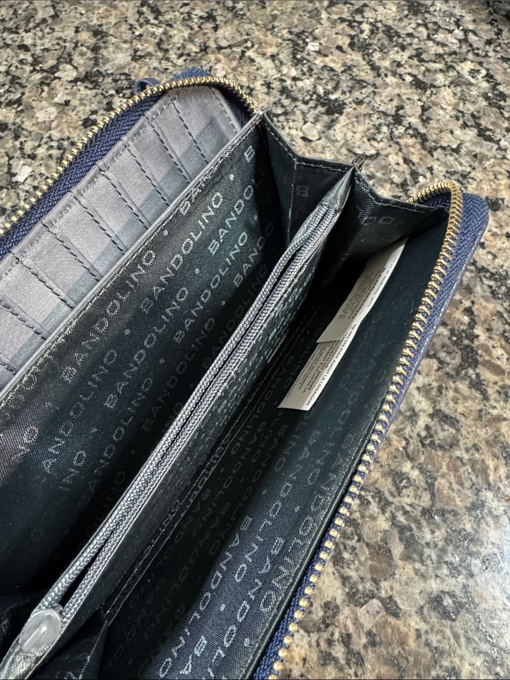 Bandolino Navy Pebbled Zip Wristlet with Gold Plaque